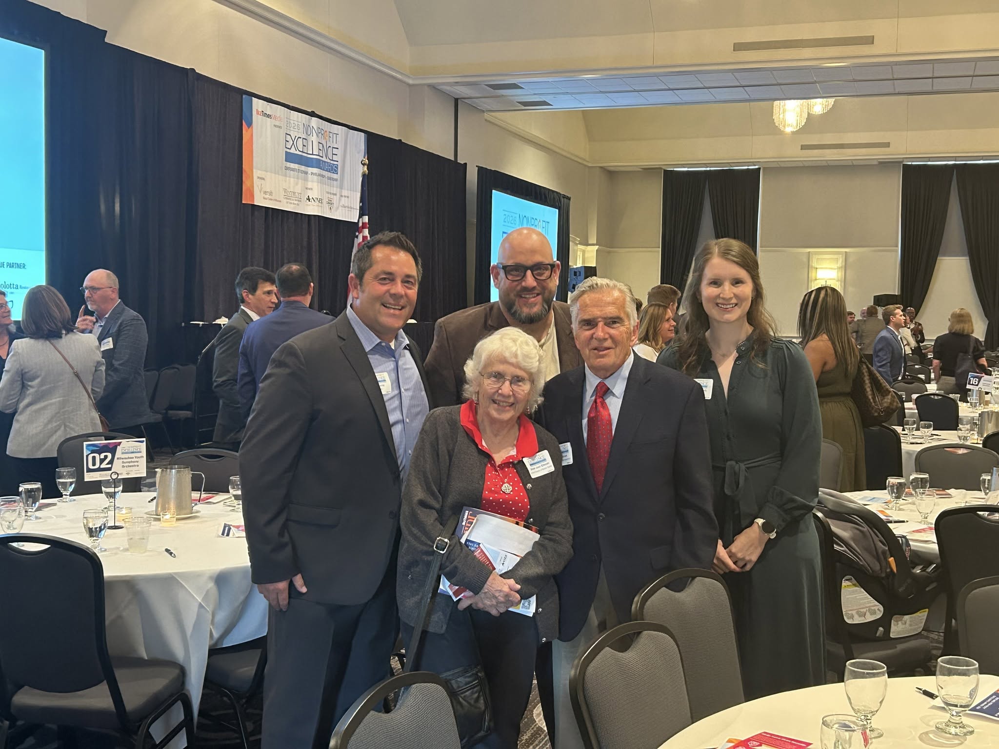 Father Gene's board members and staff at the award ceremony